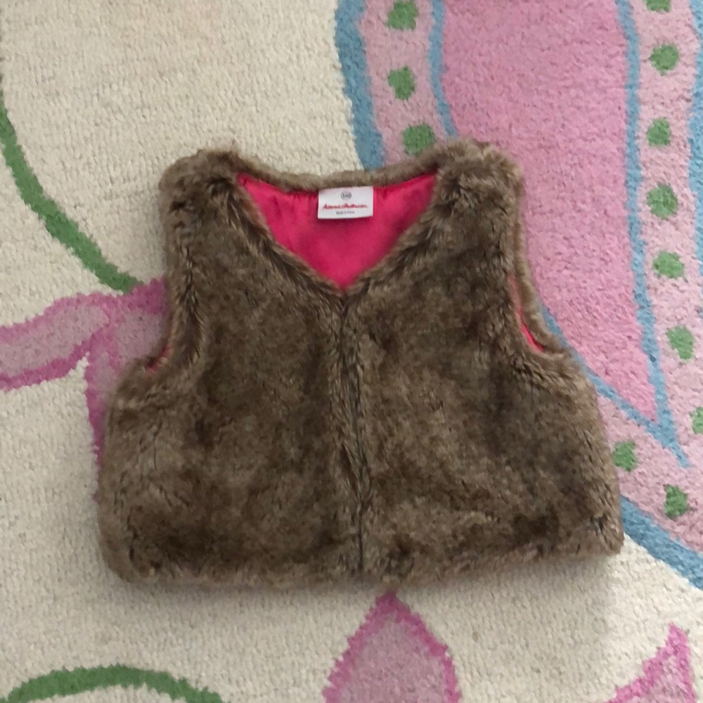 Girls faux fur vest with hot pink lining!